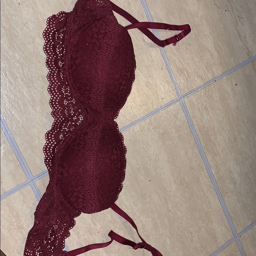 1 burgundy push up bra and 1 zebra print bra